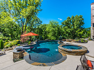 st louis pool construction, custom concrete pool, flagstone coping, textured deck
