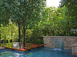 st louis pool construction, custom concrete pool, raised wall, sheer descent, wood deck