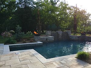 st louis pool construction, custom concrete pool, fire bowl, raised wall, paver deck