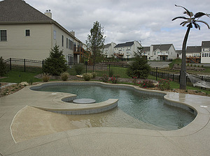 st louis pool construction, custom concrete pool, freeform, beach entry