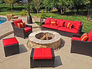 st. louis pool construction, brown wicker outdoor furniture with red cushions, fire pit