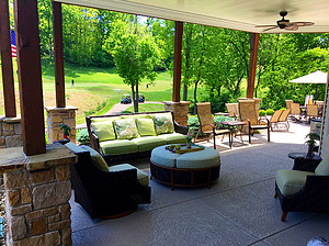 st. louis pool construction, brown wicker outdoor furniture with green cushions