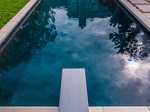 st. louis custom designed geometric concrete pool with jump board