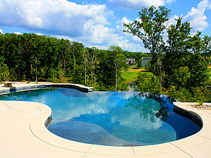 st. louis custom designed freeform concrete pool with cantilever coping and vanishing edge