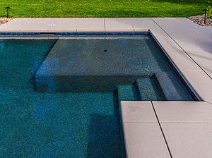 st. louis custom designed geometric concrete pool with cantilever coping and tan shelf