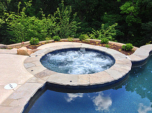 st. louis custom designed freeform concrete pool, concrete spa with flagstone cap
