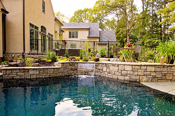 Pool With Flagstone Patio and Tanning Ledge