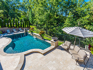 st louis pool construction, custom concrete pool, travertine patio