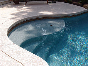 st louis pool construction, custom concrete pool, stair entry, tan shelf, textured deck
