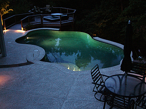 st louis pool construction, custom concrete pool, lighting, textured deck, freeform, vanishing edge