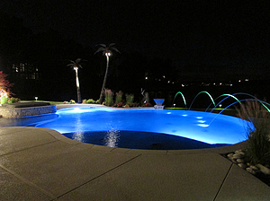 st louis pool construction, custom concrete pool, textured deck, freeform, lighting