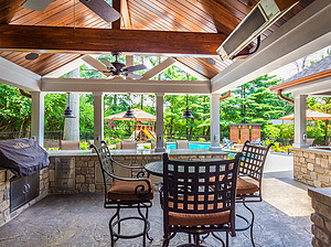 st. louis pool construction, covered outdoor kitchen with granite counter top and stone veneer, grill, seating area