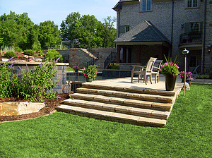 Flagstone stairs leading up to St. Louis custom designed concrete pool