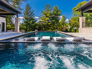 st. louis custom designed geometric concrete pool with ledge loungers, concrete spa