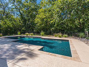 st. louis custom designed geometric concrete pool, cut stone coping