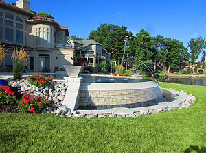 st. louis custom designed concrete pool, vanishing edge, laminar jets, colorful landscaping