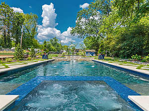 st. louis custom designed geometric concrete pool, concrete spa with tile spillover