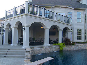 st. louis custom designed concrete pool, covered patio with concrete steps and seating area