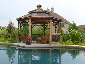 st. louis custom designed freeform concrete pool, gazebo with seating area