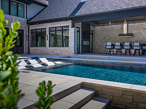 st. louis custom designed geometric concrete pool, covered patio and seating area