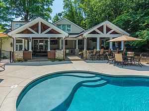 st. louis custom designed freeform concrete pool, covered patios with seating areas