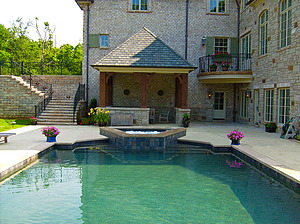 st. louis custom designed concrete pool, covered patio structure, outdoor seating and dining area